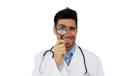 Young-doctor-looking-through-magnifying-glass