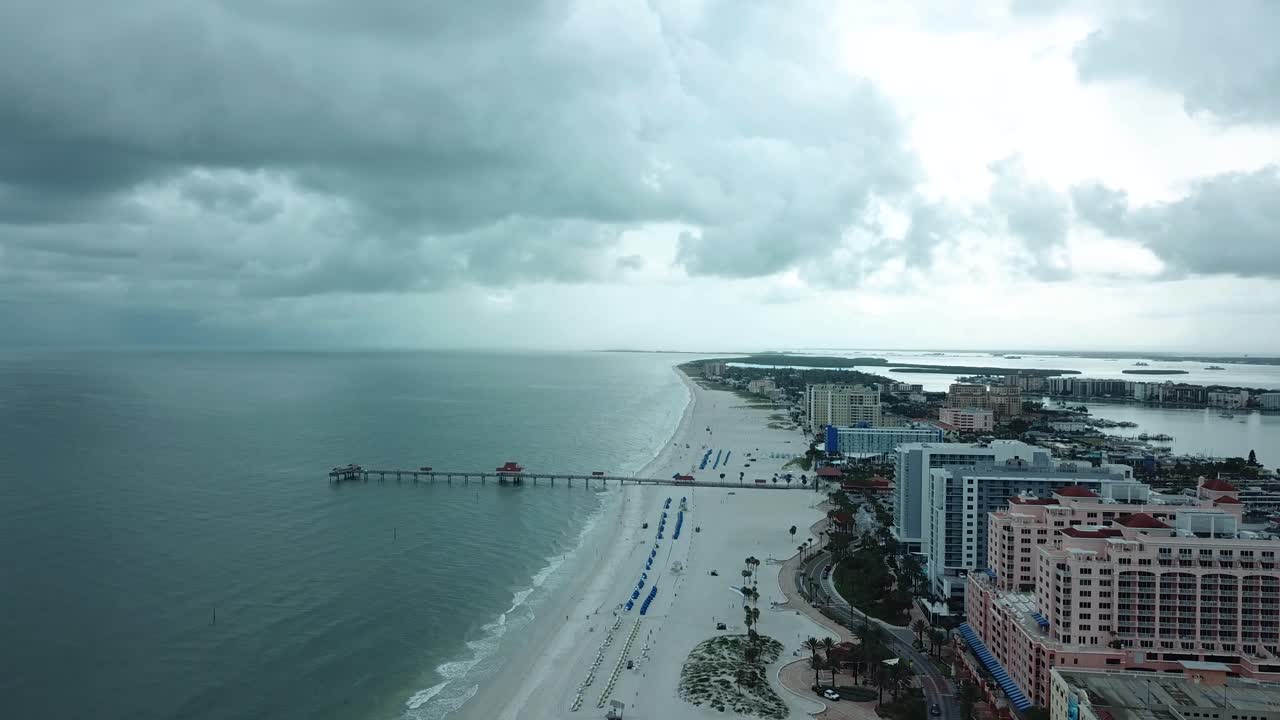 Aerial View of Hotels on a white sand beach in Clearwater, Florida on a Cloudy Sky
