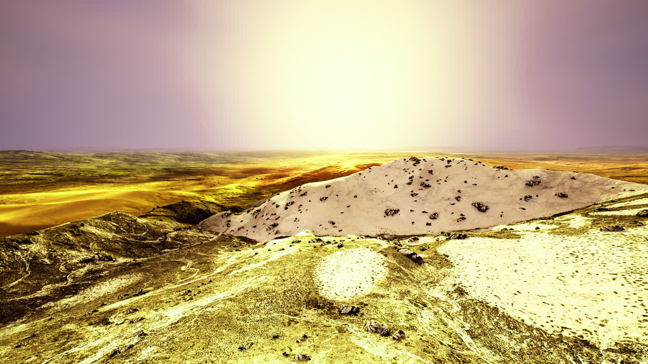 Golden horizon unfolds over vast desert landscape at sunset