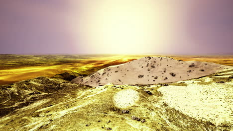 golden horizon unfolds over vast desert landscape at sunset