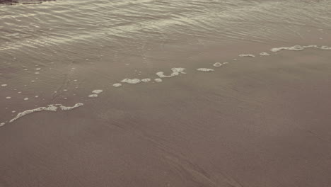 ocean rolling in over the beach