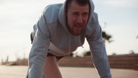 man doing push-ups outdoors