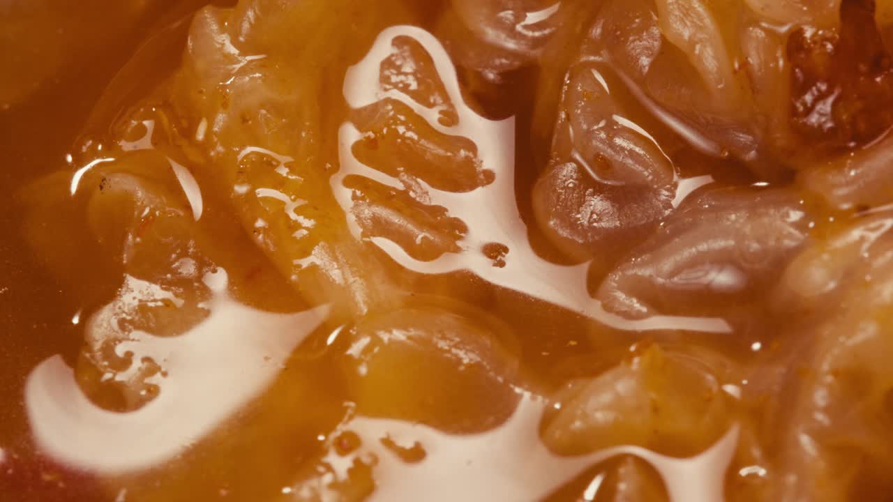 Close-up of texture fermented spicy cabbage kimchi with in can. Preservation of vegetables in glass jars. Fermentation preserved kimchi cabbage with spices macro. Asian cuisine.