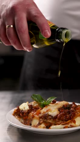 chef preparing a delicious lasagna