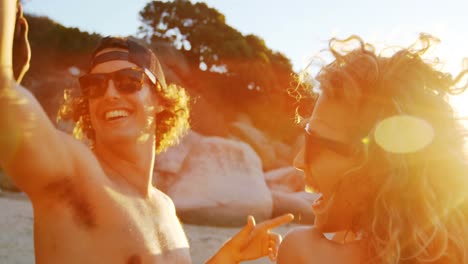 group of friends having fun in the beach 4k