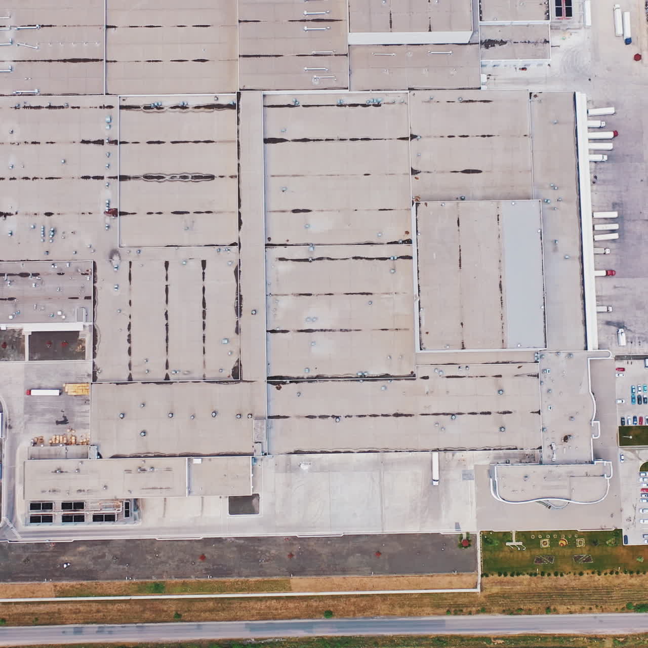 Modern Factory Exterior. Aerial footage of a large industrial complex.