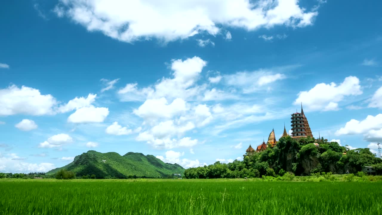 4k Time-lapse, landscape beautiful sky with green cornfield at Tiger Cave Temple (Wat Tham Sua) in Kanchanaburi province Thailand