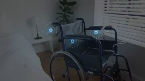 animation of medical icons over wheelchair in hospital room