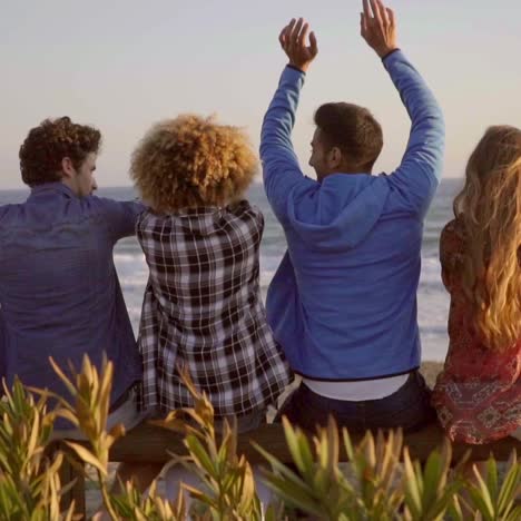 Young-People-On-Wooden-Fence-