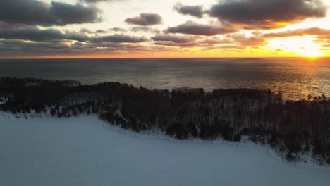 slow push in toward lake michigan during a winter sunset