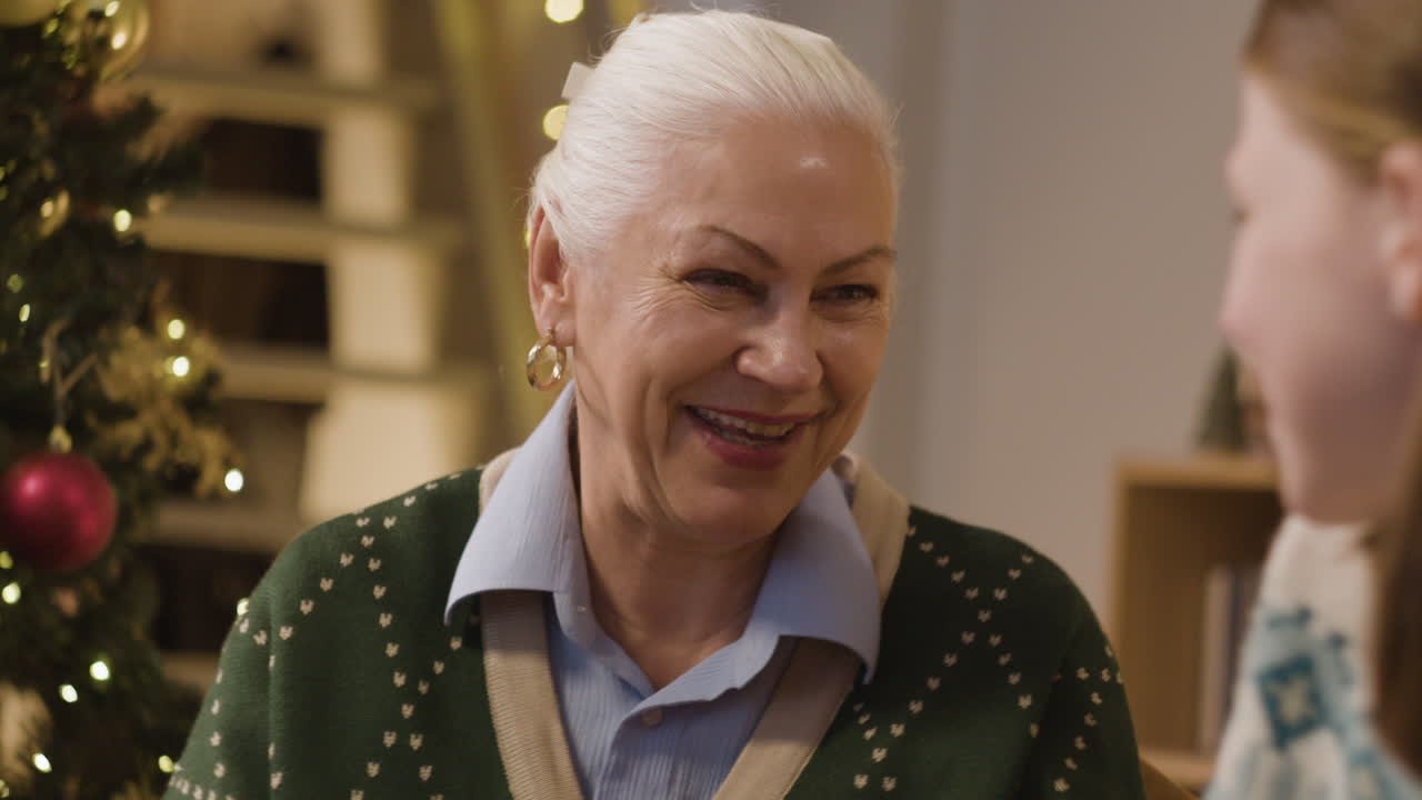 Senior Woman Receiving Christmas Gift