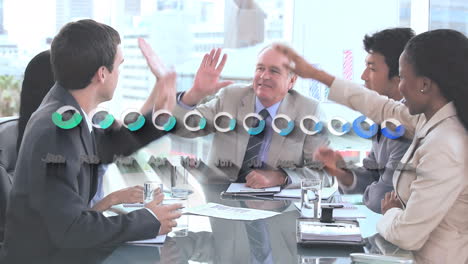 statistical data processing over diverse businesspeople high fiving each other at office