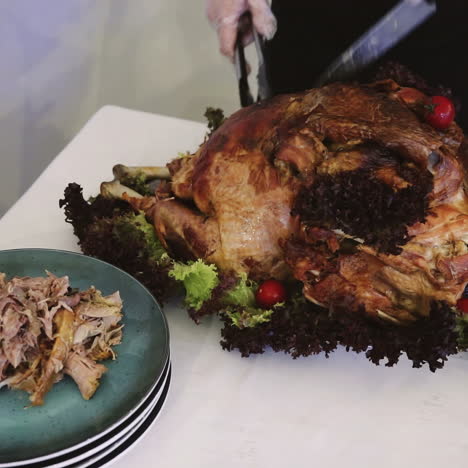thanksgiving or christmas turkey dinner. hands of a man carving a roast turkey sqare video