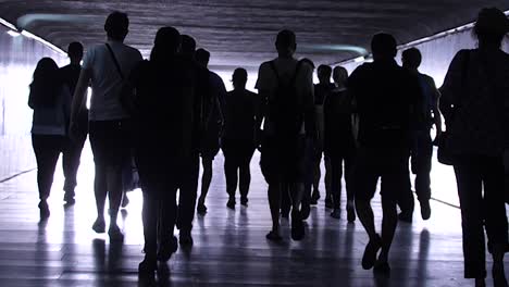 People-Walking-Through-Tunnel