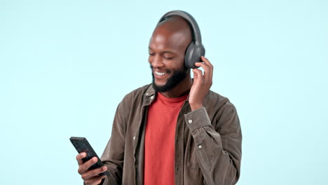headphones, mobile app or happy black man