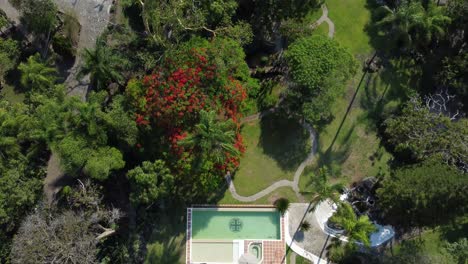 aerial shot of a beautiful house with pool