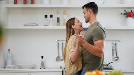 Dance,-happy-and-couple-in-the-kitchen