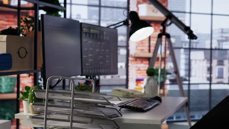 pc screens in innovative startup office showing programming languages