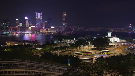 hong kong ifc victoria harbour nightview of tsim sha tsui skyscrapers and ferries timelapse