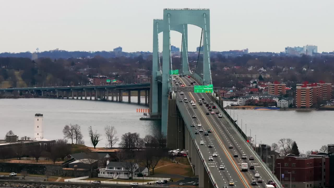 An aerial view of the Throgs Neck Bridge from over the Long Island Sound, NY on a cloudy day