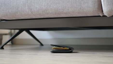 lost wallet found underneath sofa