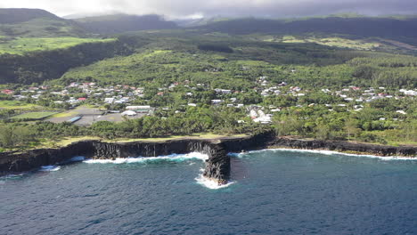 Aerial-view-over-the-Lava-rock-formation-of-Cap-Mechant-and-the-coastline-of-Reunion-Island