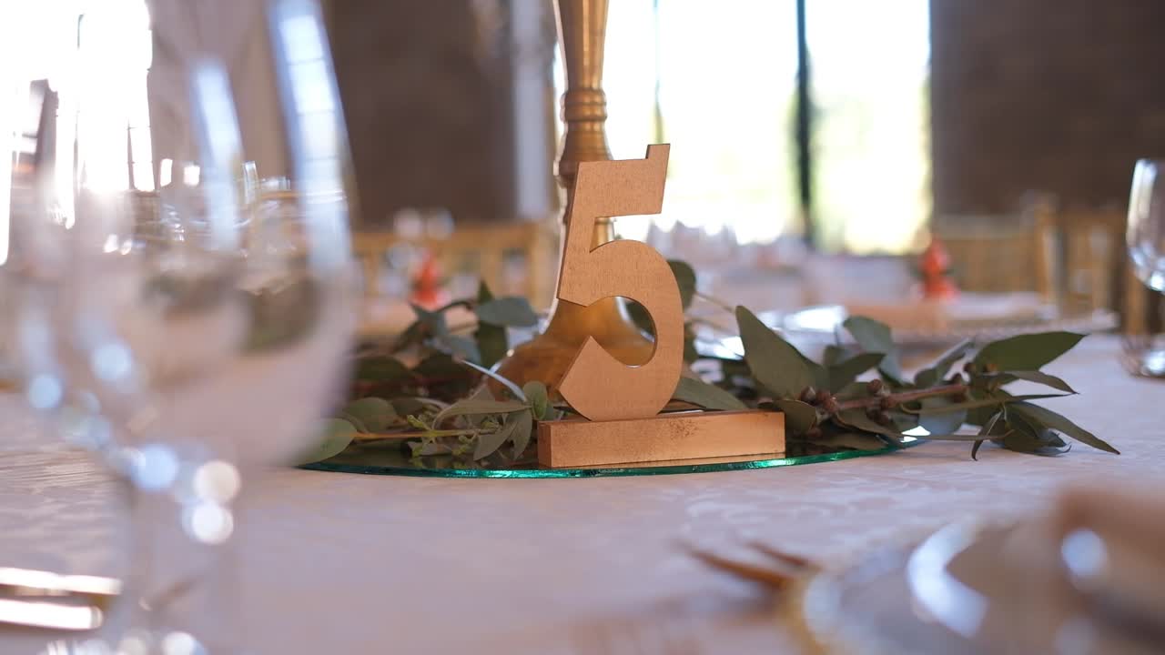 Golden Wedding Table Number Sign At The Reception Venue