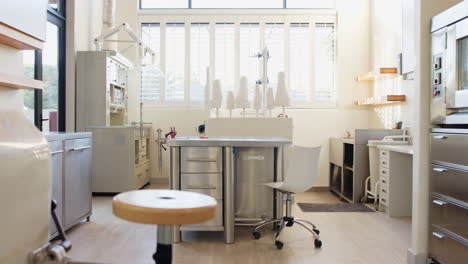 a prosthetic lab with various equipment and tools, well-organized and clean