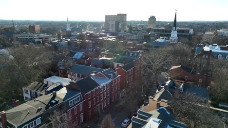 High-aerial-of-houses-in-inner-city-Lancaster,-Pennsylvania-in-winter