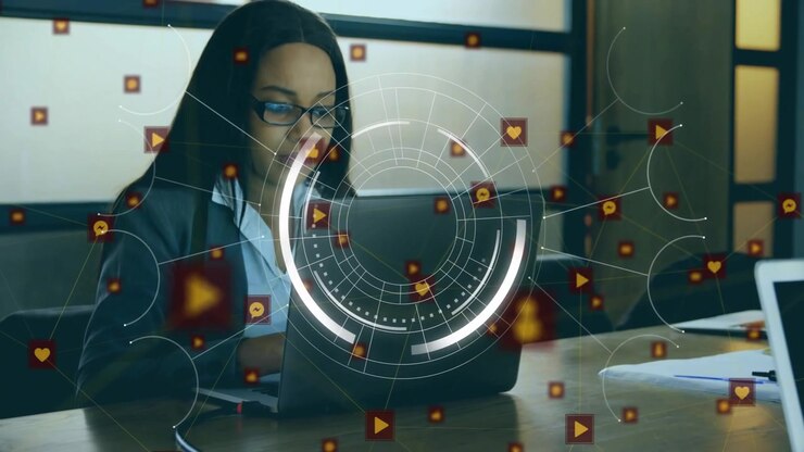 Vertical video: Woman leaning over laptop typing as HUD appears, floating icons guiding ads
