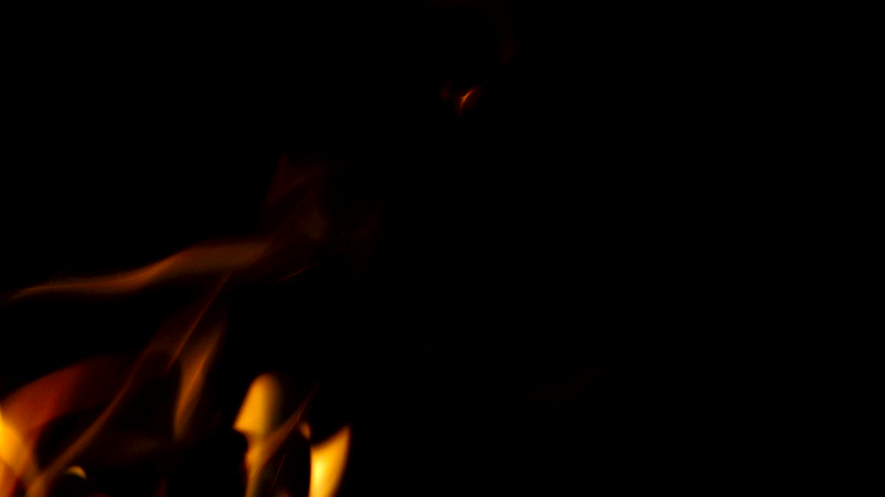 Realistic Fire closeup with alpha matte black background, loopable, easy integration. UHD stock video