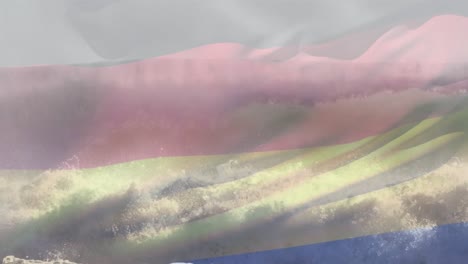 animación de la bandera de alemania ondeando sobre el paisaje marino de la playa