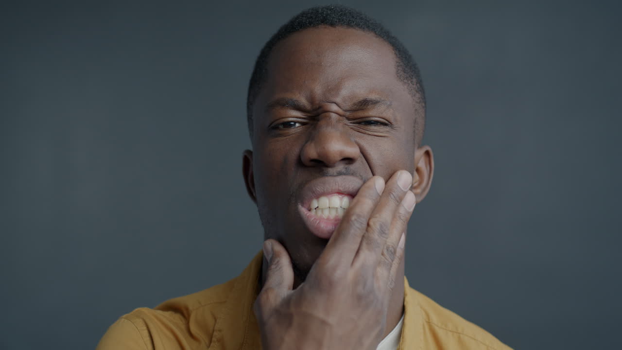 Man Experiencing Tooth Pain