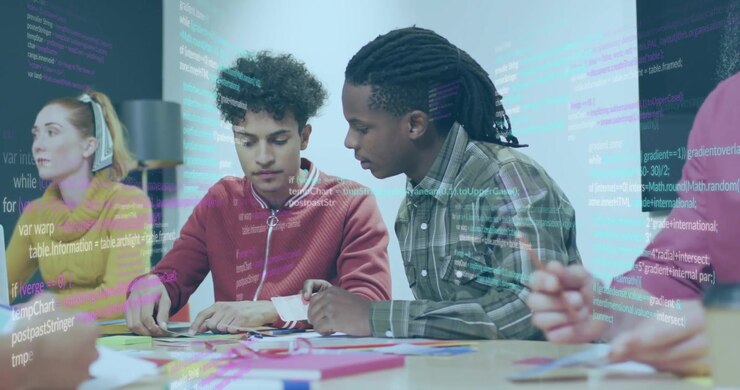 Man in red hoodie pointing, men folding paper and assembling design with code overlay across scene