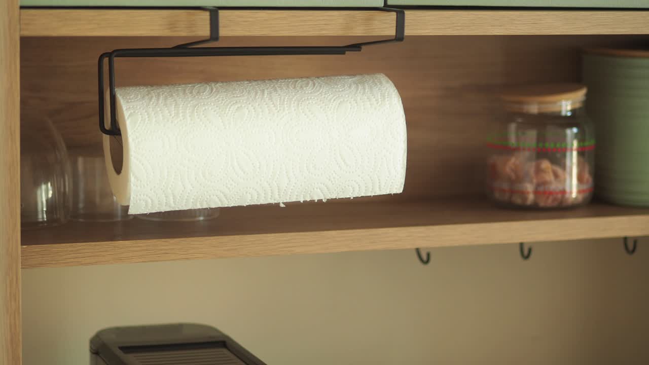 Paper Towel Roll on an Under-Shelf Holder in a Kitchen