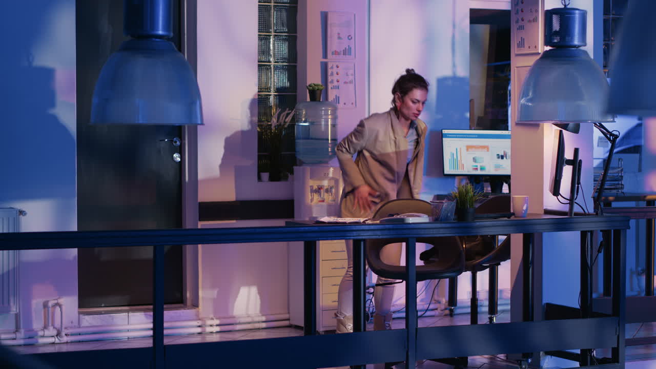 Woman working late in office