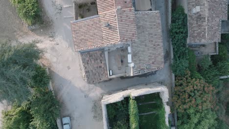 Aerial-Drone-Top-Down-Luberon-Provence-Saignon-France-Medieval-Town-at-Sunrise