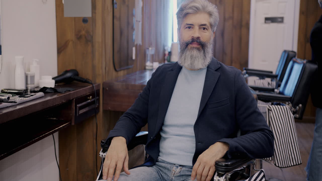 Man Getting a Haircut at Barber Shop