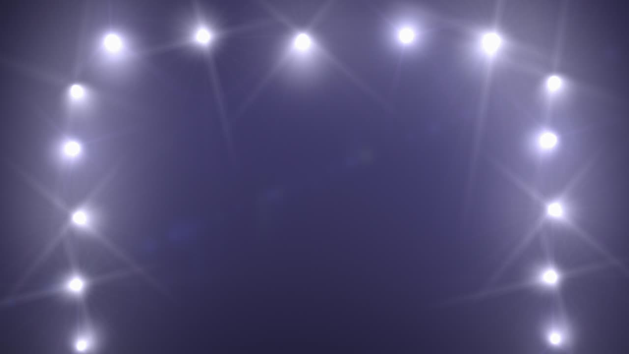 Bright light from the searchlight. Night club lighting. Light effect from the projector.