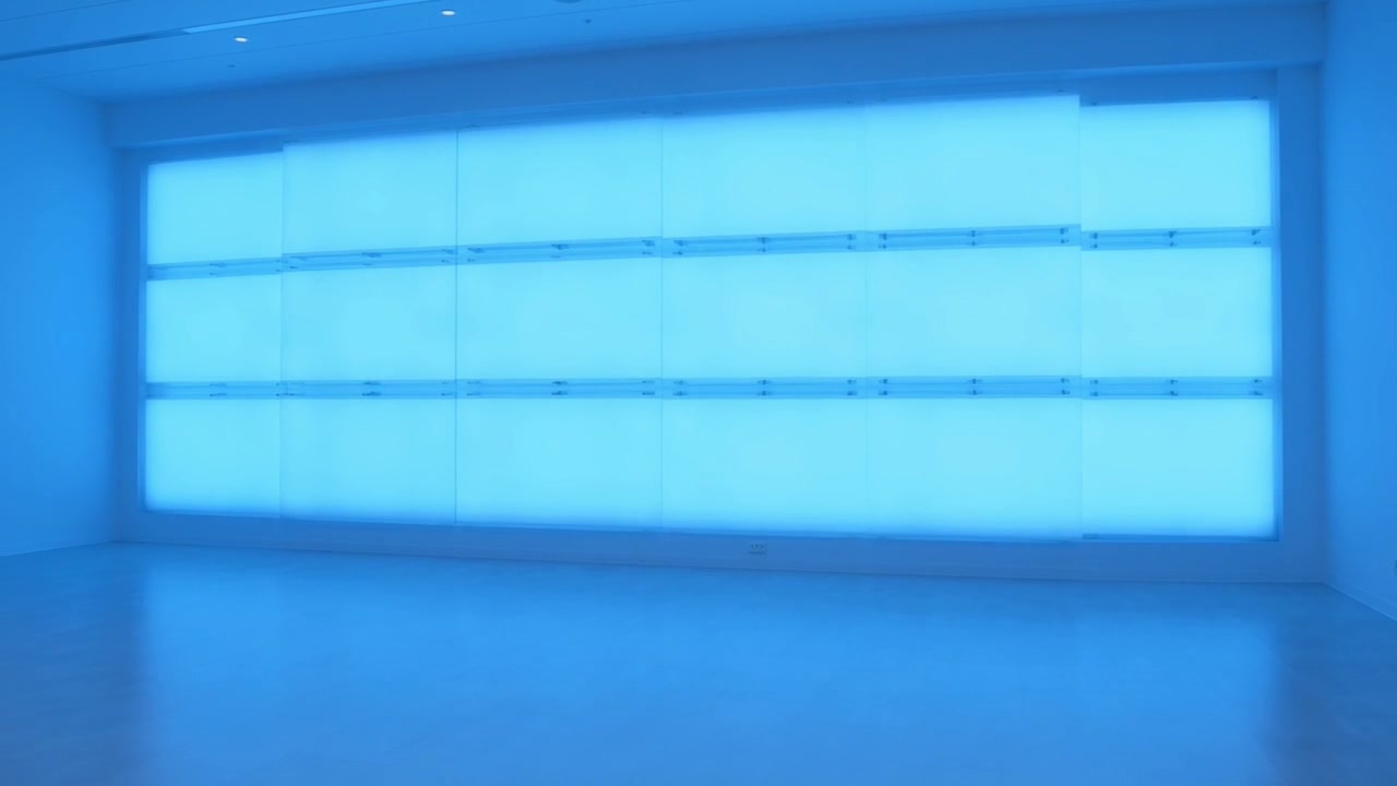Empty Room with Blue Glowing Panels and Ambient Light