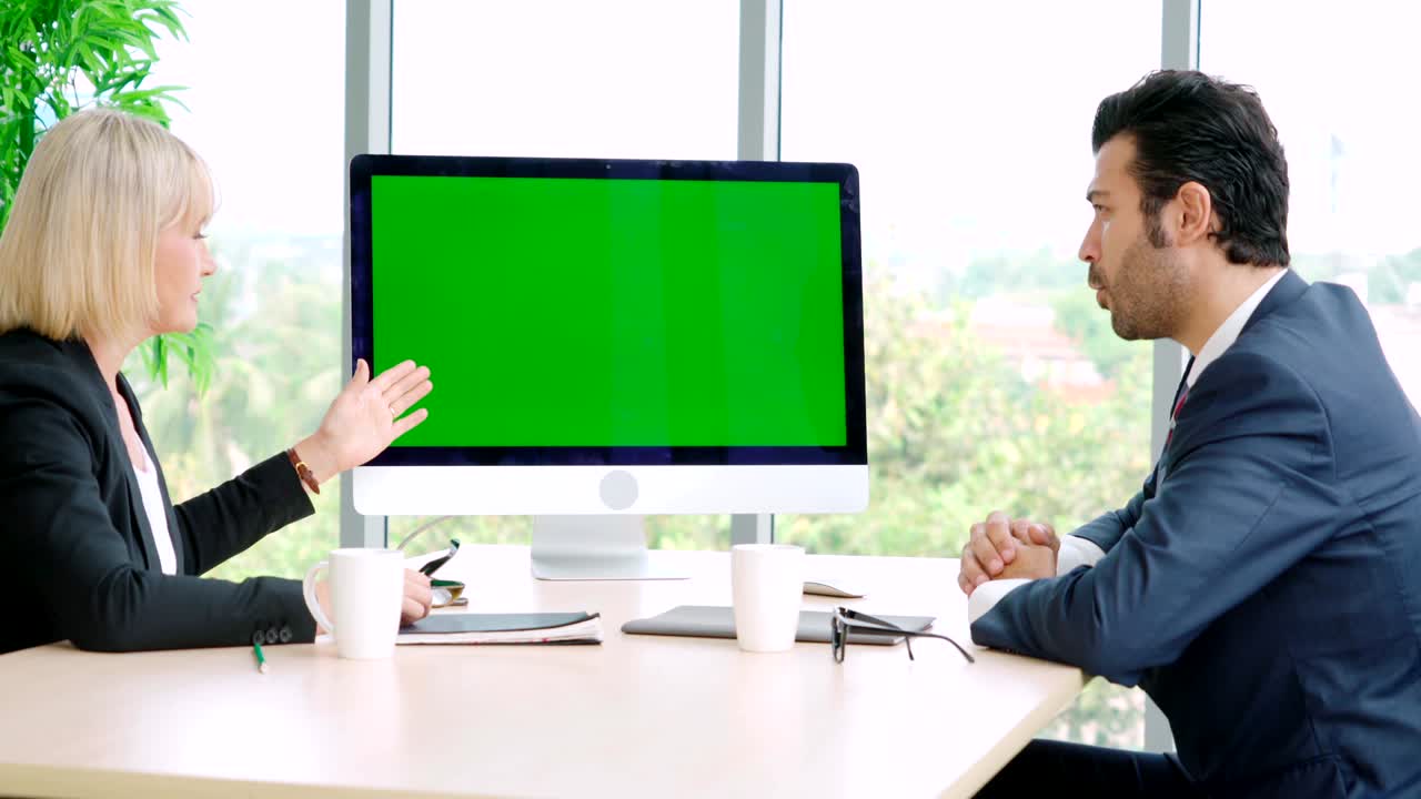 Business people in the conference room with green screen