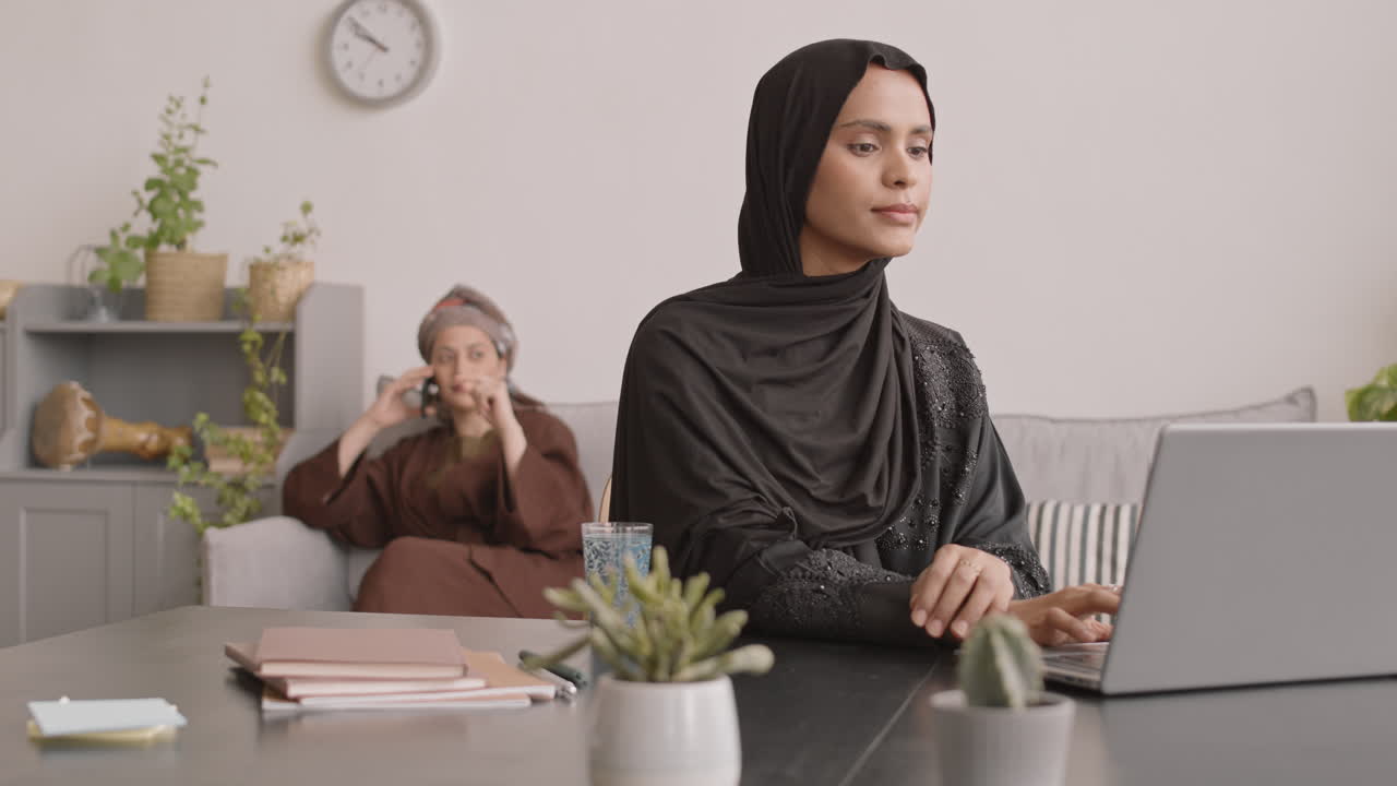 Muslim Women Working from Home Together