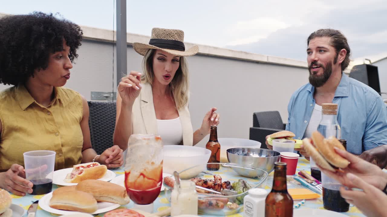 People eating together at a picnic