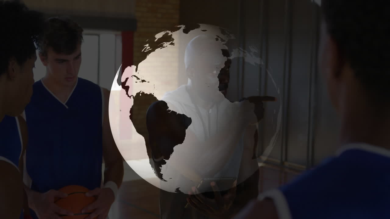 Basketball coach instructing team with rotating globe animation in school gym