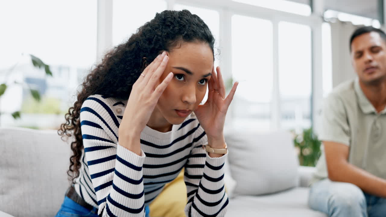 Couple, argument and fight on sofa