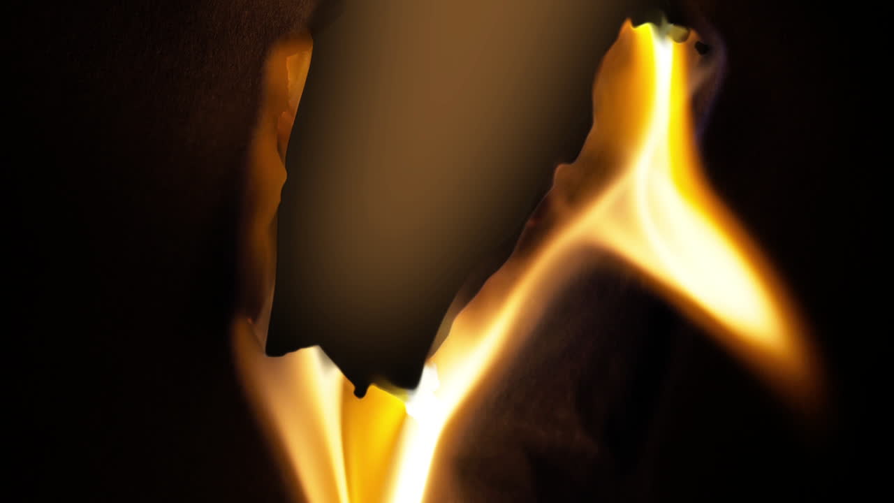 Dynamic Fire Burning Paper Edge with Dark Background