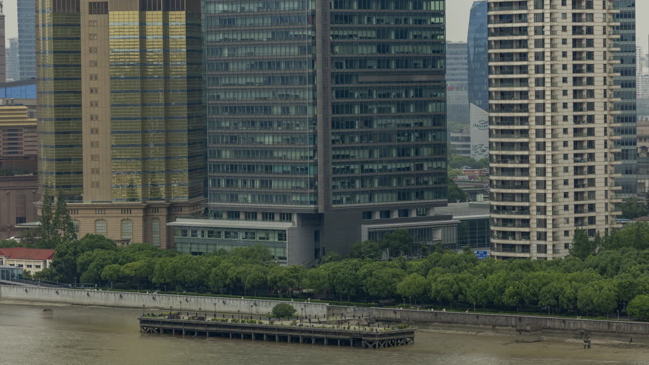 Timelapse of the Shanghai city skyline with traffic passing at nigh
