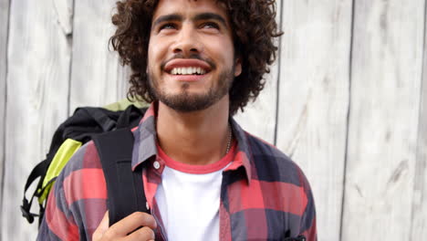 young man looking away outdoors