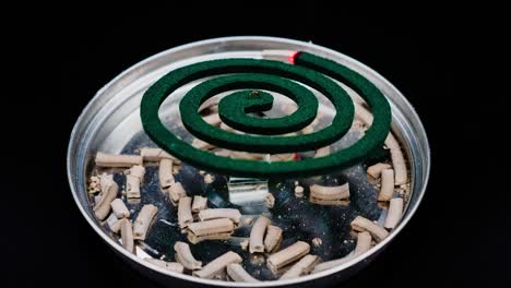 Mosquito-Coil-Repellent-timelapse-with-dark-room-Close-Up-Of-Mosquito-Coil-timelapse-at-dark-room