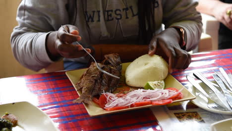 delicious grilled fish with ugali and vegetables